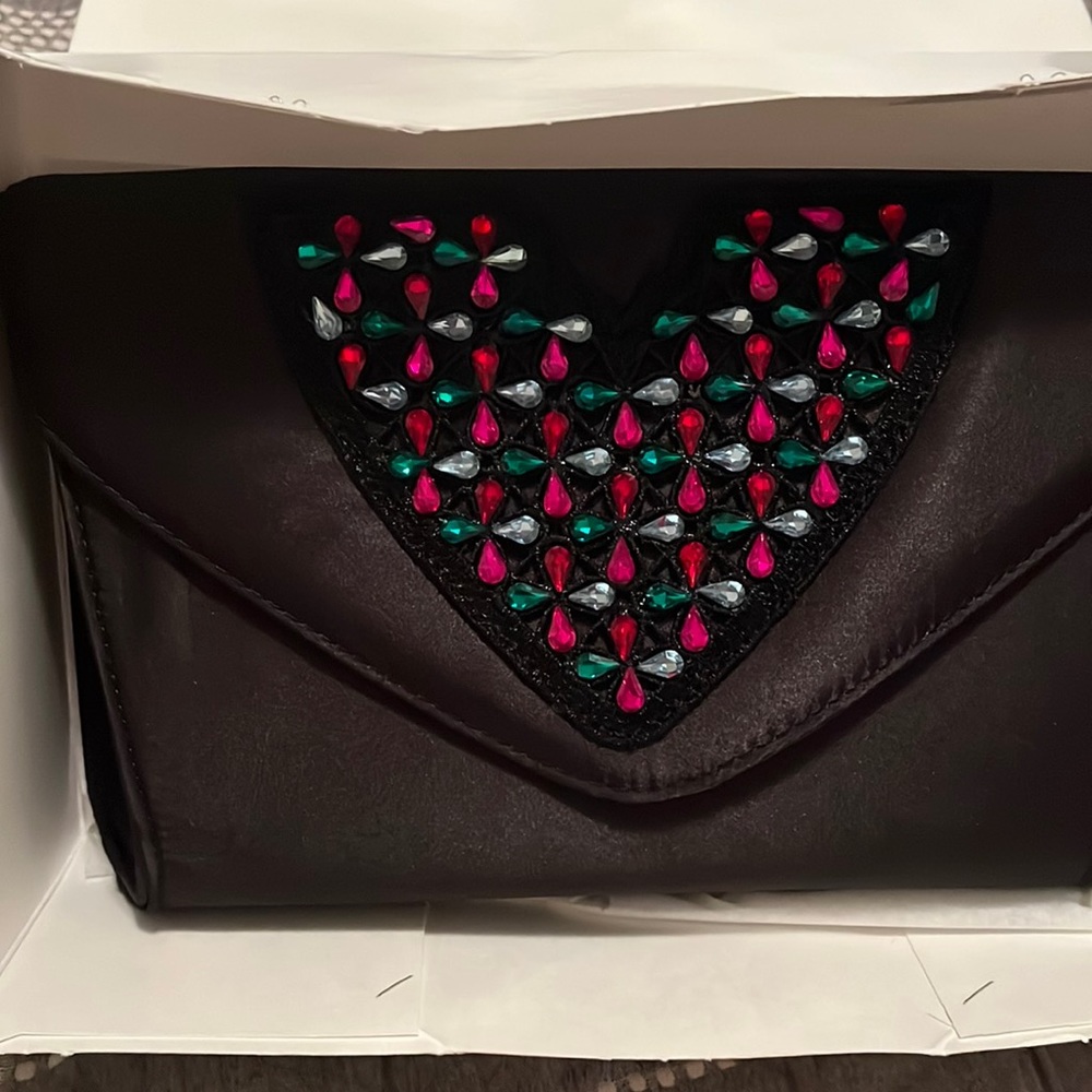 Brand new black satin purse still in box